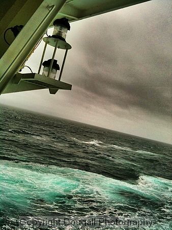 Regular day at sea as seen from the fantail of the ship.