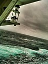 Regular day at sea as seen from the fantail of the ship.