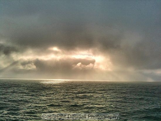 Clouds and sun over Labrador Sea